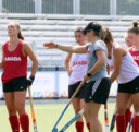 Team Canada female field hockey players and their coach