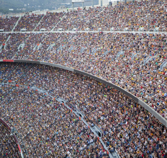 Spectators in a stadium at a sporting event