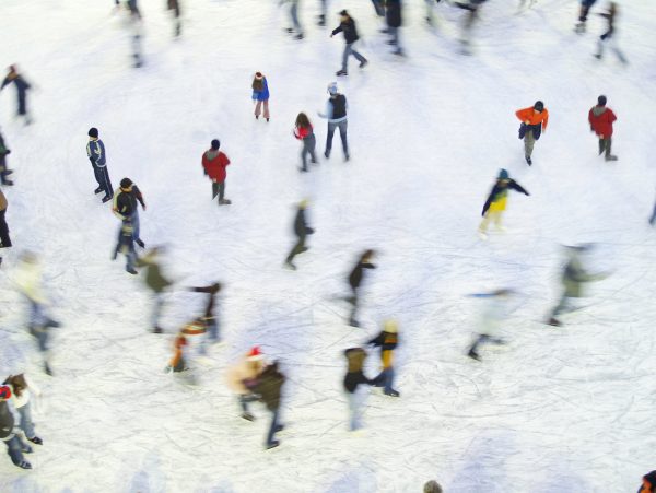 People engaging in outdoor skating in the Winter