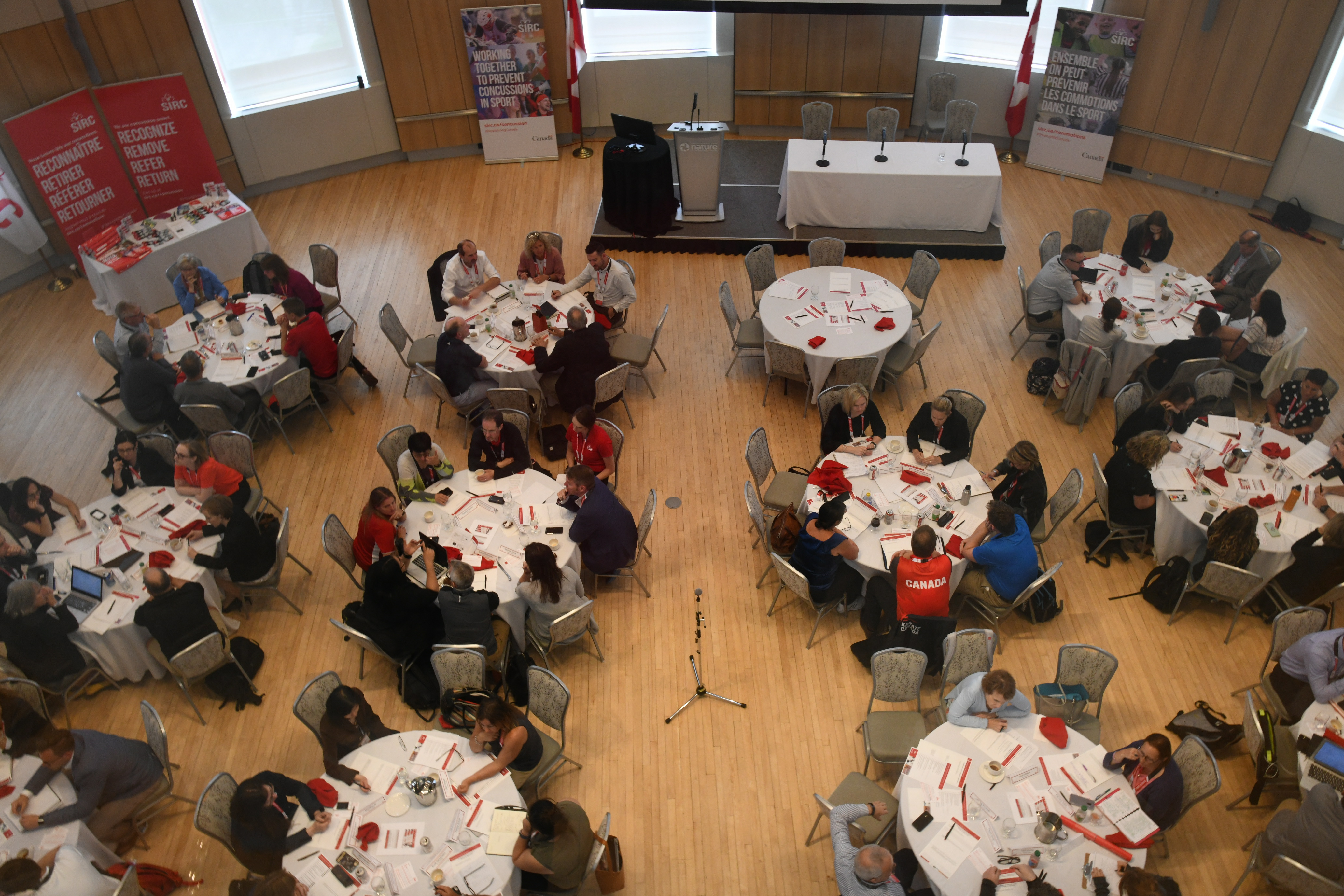 Birdseye view of round table discussions at a local conference.