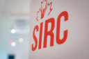 SIRC logo displayed on wall