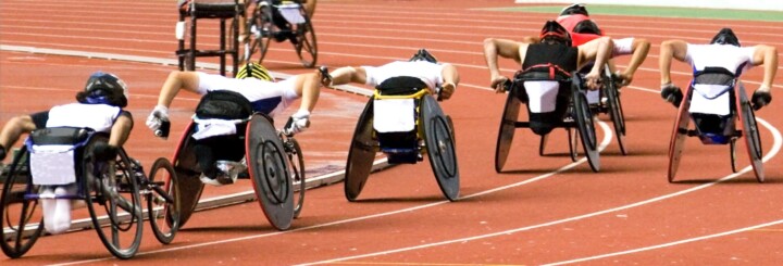 Wheelchair athletes competing on a track