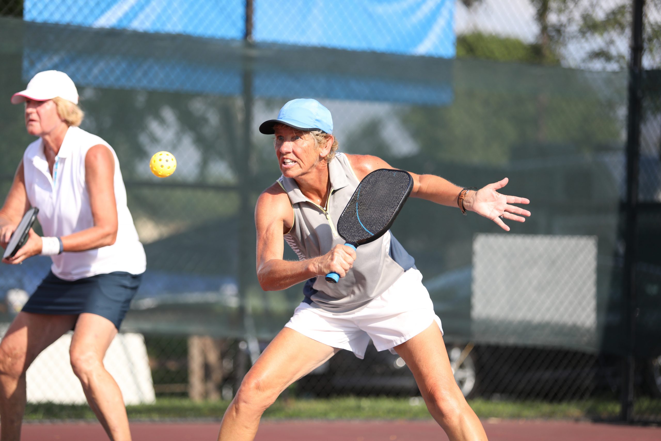 Women playing pickle-ball