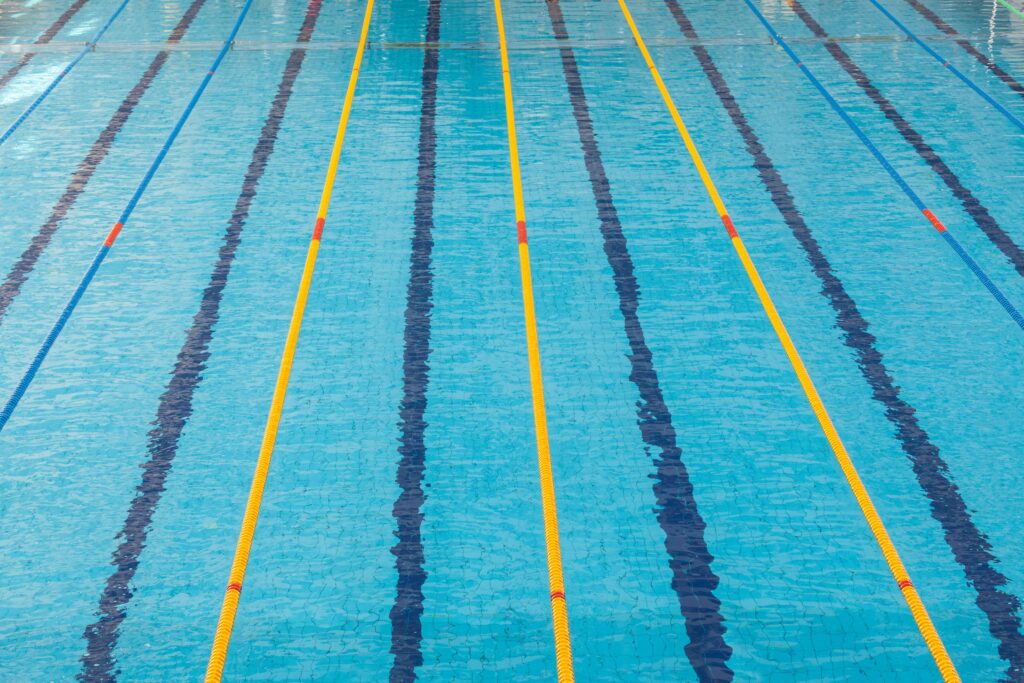 Clear, transparent water in Olympic swimming pool