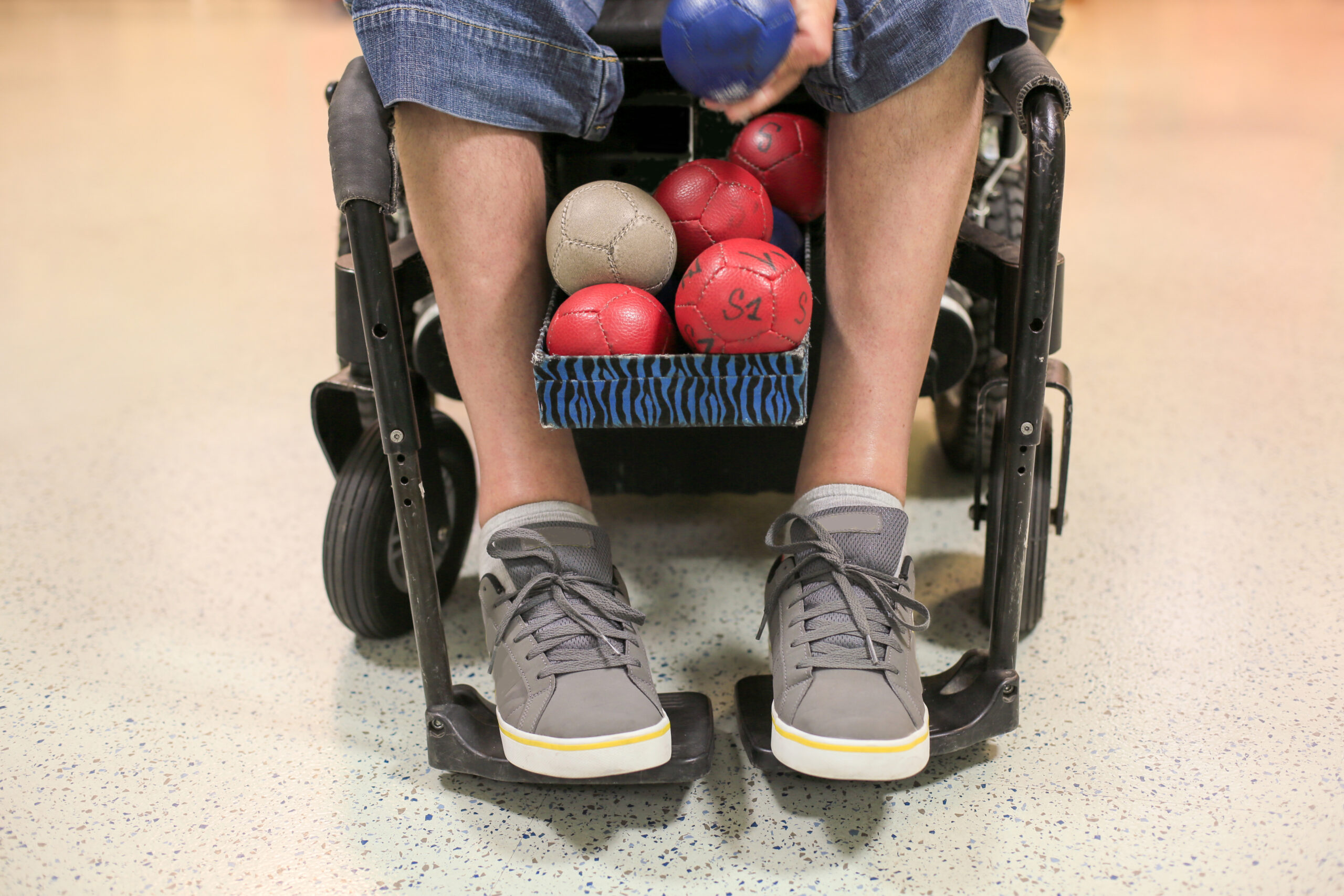 Disabled Boccia player training on a wheelchair