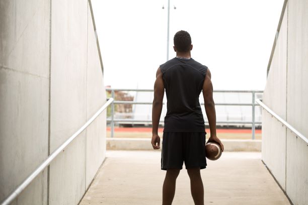 rear view of black football player 