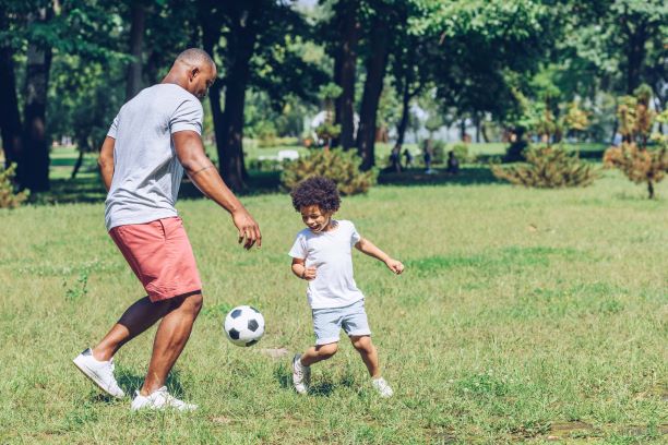 Motivation and Sport Concept. Father and Son Sporting - Family