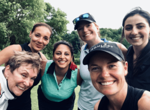 Group of women golfers smiling and taking a selfie. Members of Iron Lady Golf. 