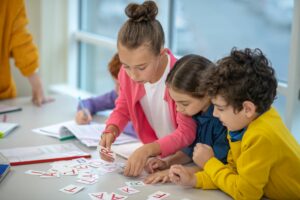 Children learning the alphabet while doing interesting tasks