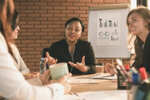 Diverse woman leaders in meeting room