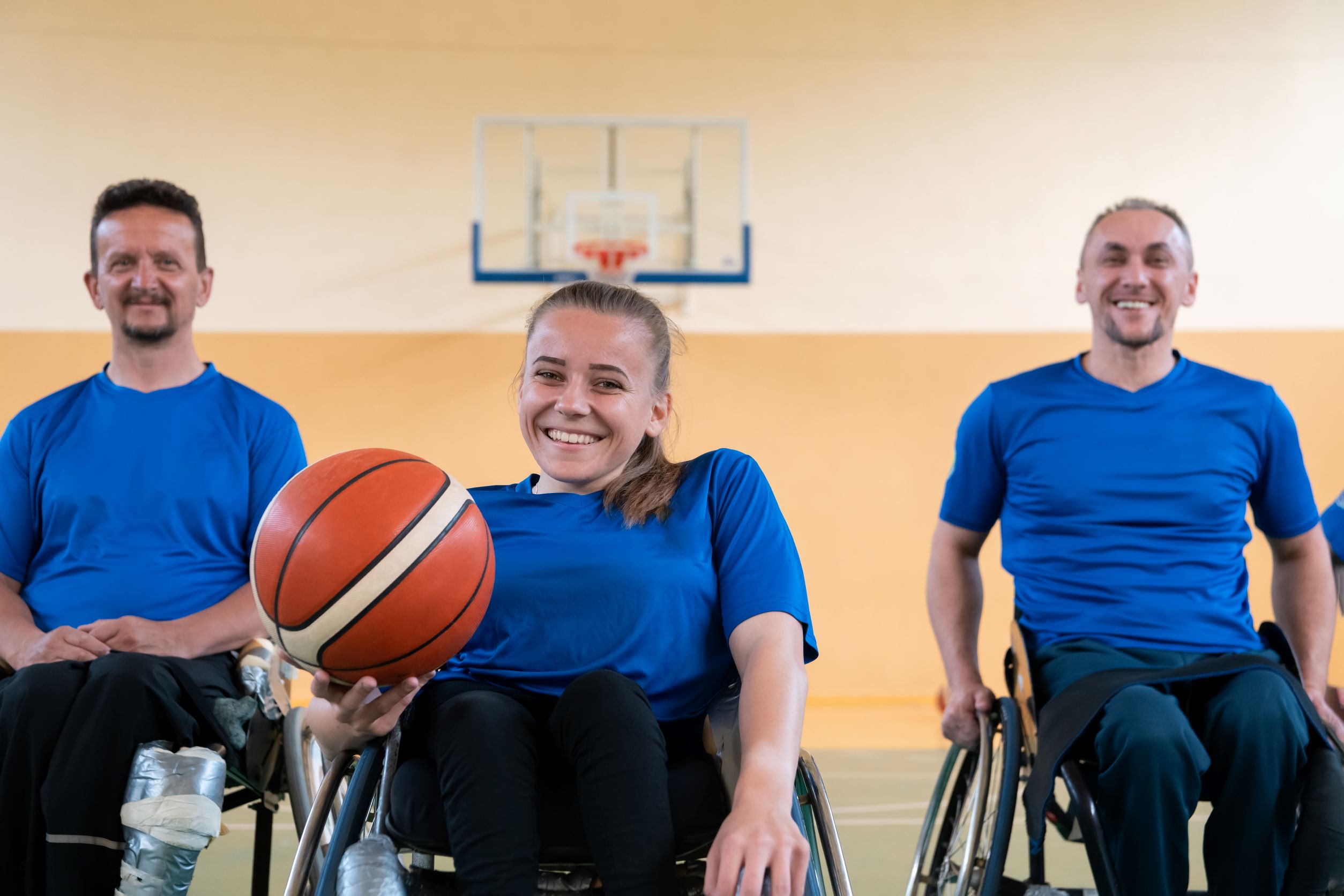 Wheelchair basketball players posing for a picture