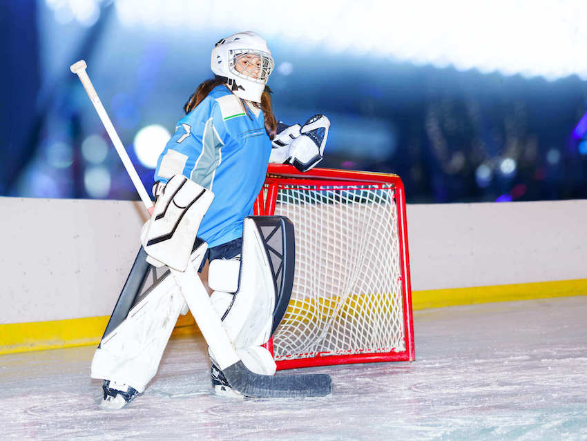 Female hockey goalie