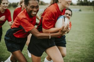 girls playing rugby