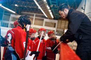 A Hockey Coach teaching game plan tactics