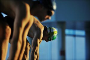 Male swimmer waiting to start a race