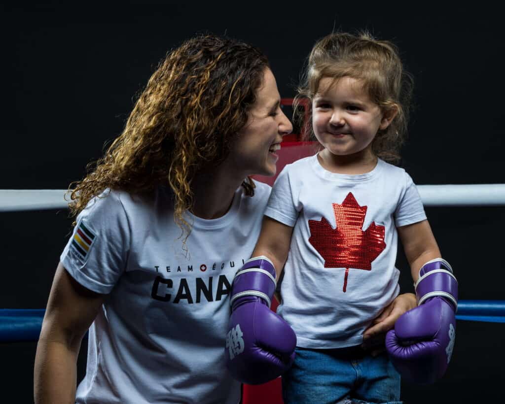 Mandy Bujold with her daughter with boxing gloves