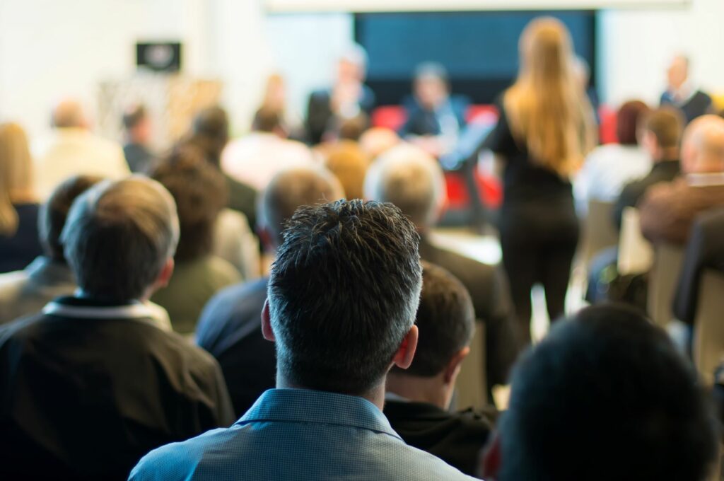 stakeholders at a conference/meeting