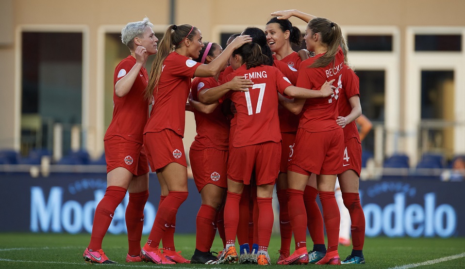 canadian womens soccer team celebrate together