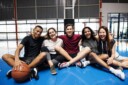 Teenaged peers come together to play sports