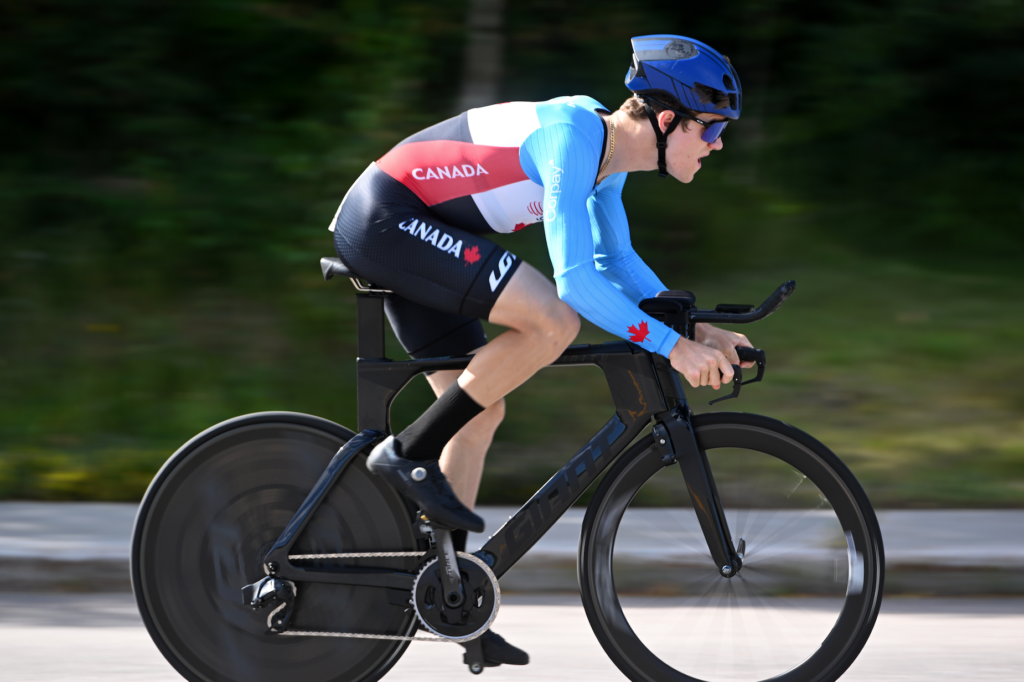 Alex Hayward riding his bike wearing a Team Canada kit.