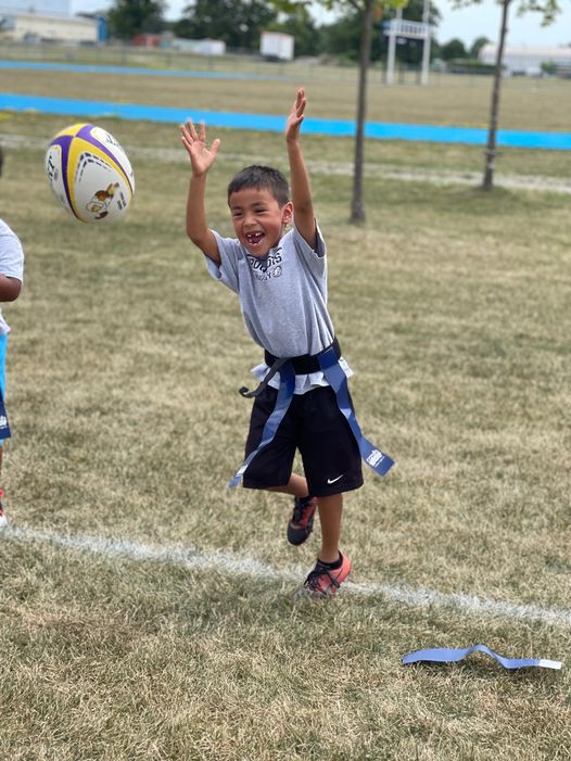 Little boy playing rugby, sent in by Jumpstart non-profit