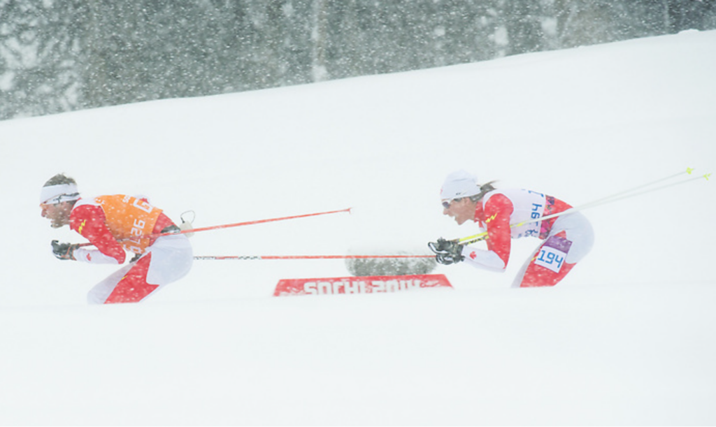 Robbi Weldon races in Para nordic with her guide at the Sochi 2014 Paralympics