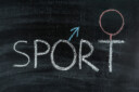 Sport is spelled out in white chalk with the O being turned into the male gender symbol and the T turned into the female gender symbol.